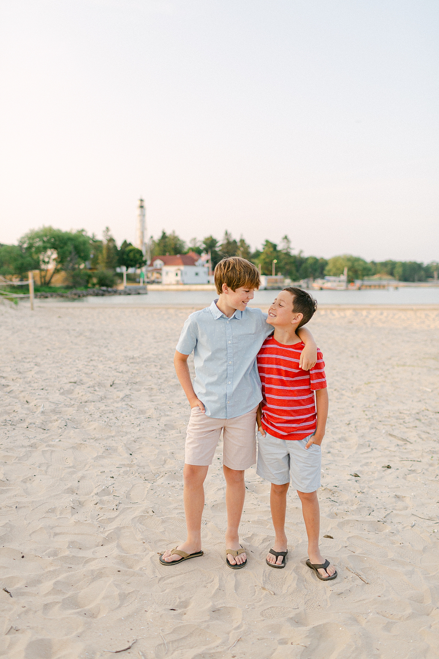 Two brothers posing for photos at a Sturgeon Bay Canal Light Family Session