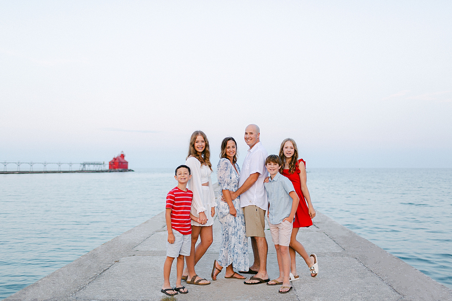 Family of six on the pier at the Sturgeon Bay Canal Nature Preserve. Family Photo Locations in Door County
