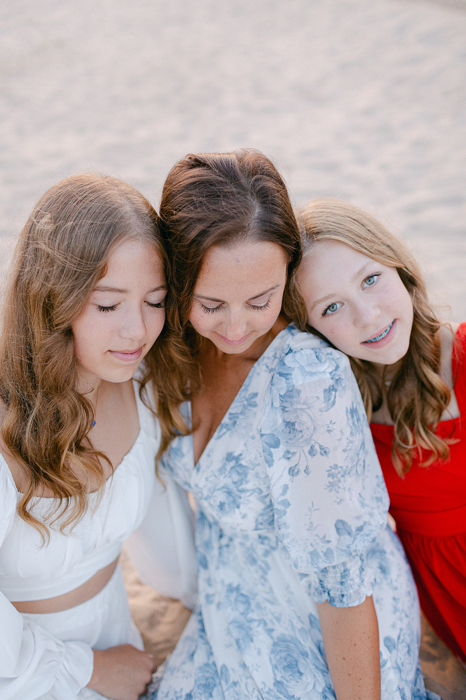 Mom & Daughter photo on the beach at their Sturgeon Bay Canal Light Family Session